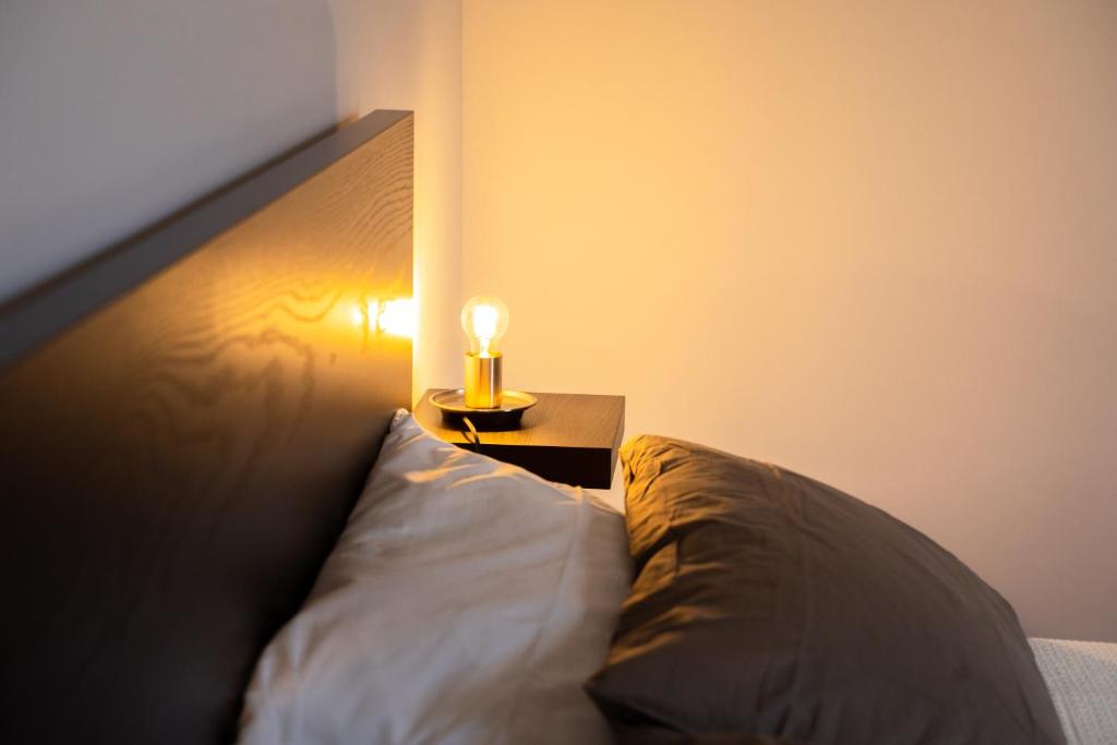 Łóżko lub łóżka w pokoju w obiekcie Civico64 apartments