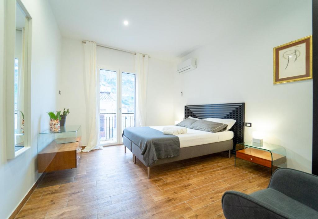 Łóżko lub łóżka w pokoju w obiekcie Civico64 apartments