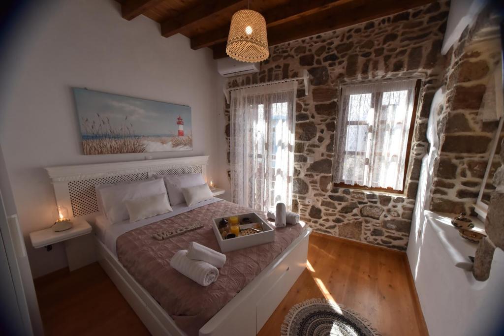 Postel nebo postele na pokoji v ubytování Patriko Nisyrian Guesthouse