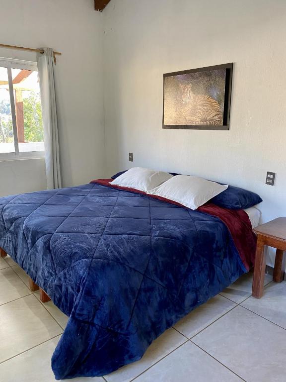Postel nebo postele na pokoji v ubytování Herradura VIP Inn
