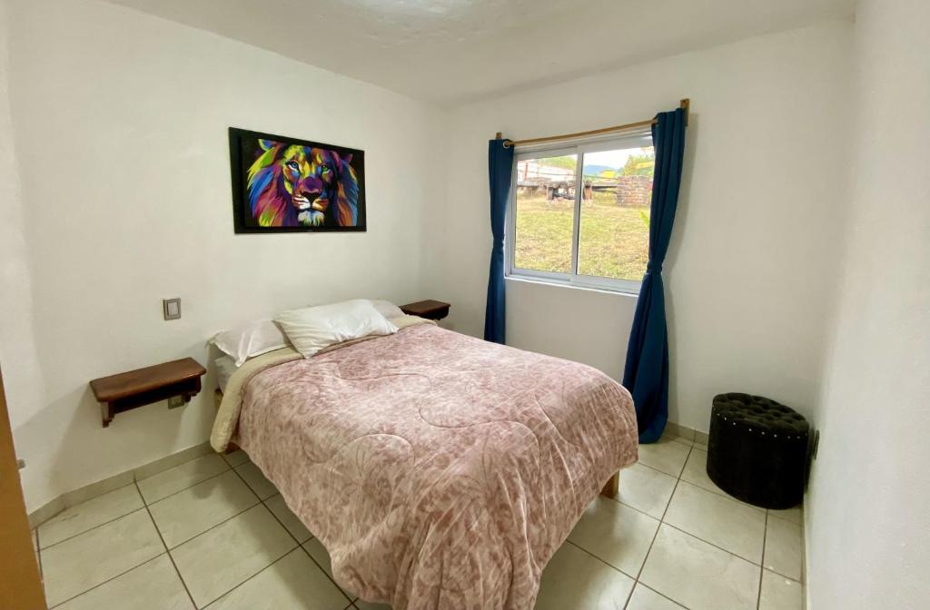 Postel nebo postele na pokoji v ubytování Herradura VIP Inn