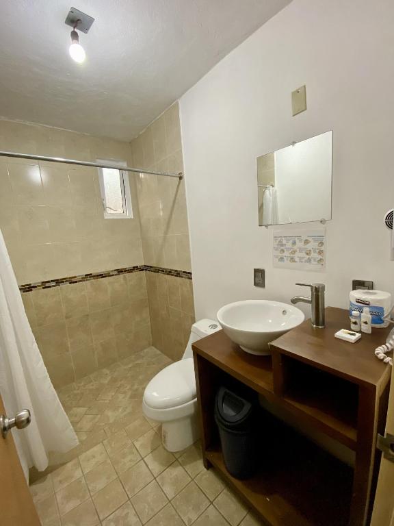Koupelna v ubytování Herradura VIP Inn