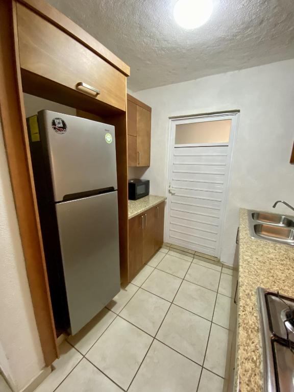 Kuchyň nebo kuchyňský kout v ubytování Herradura VIP Inn