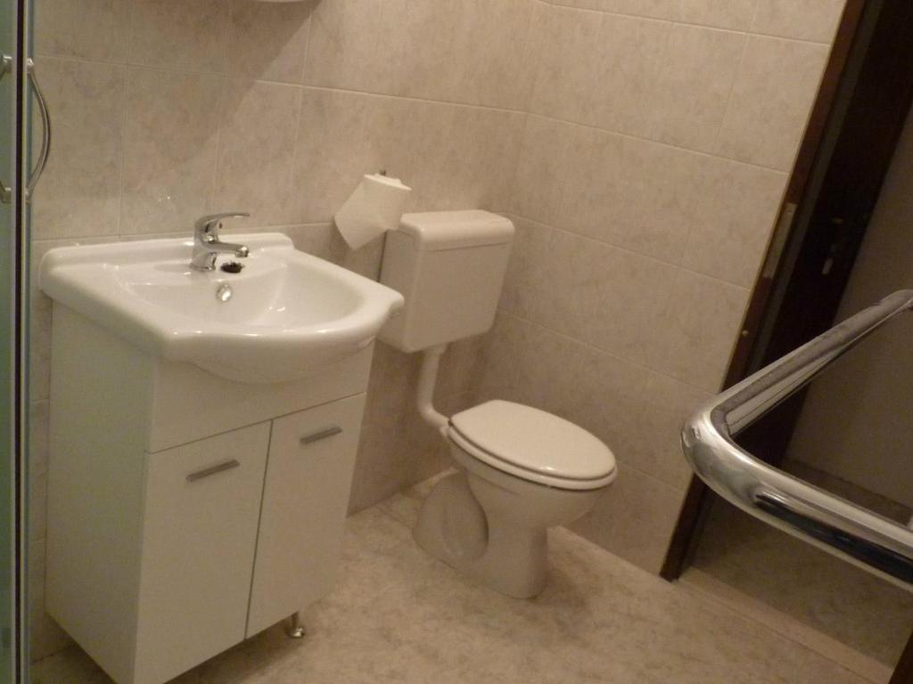 Kúpeľňa v ubytovaní Apartments and Room Marin