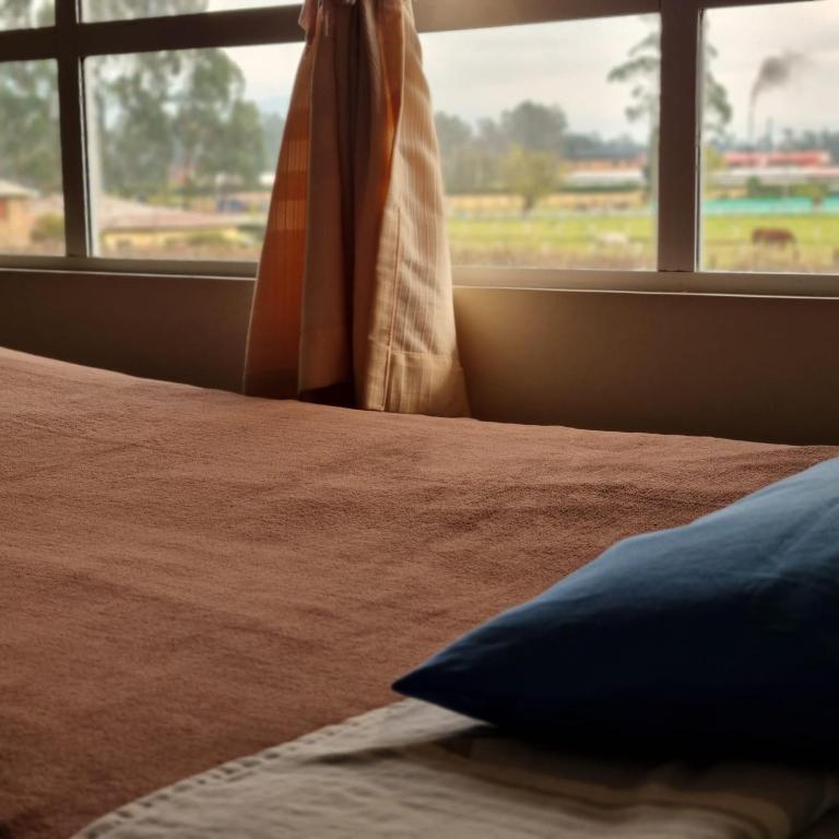 Postel nebo postele na pokoji v ubytování Hotel Susagua