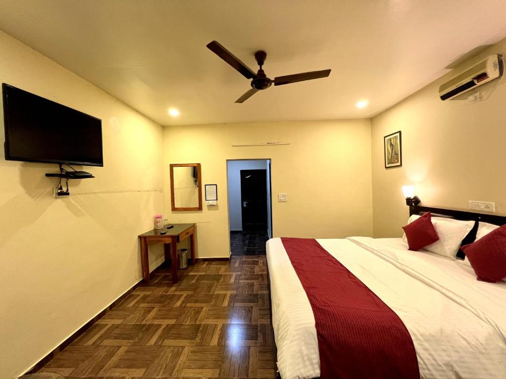 Postel nebo postele na pokoji v ubytování Hotel Sagarmatha