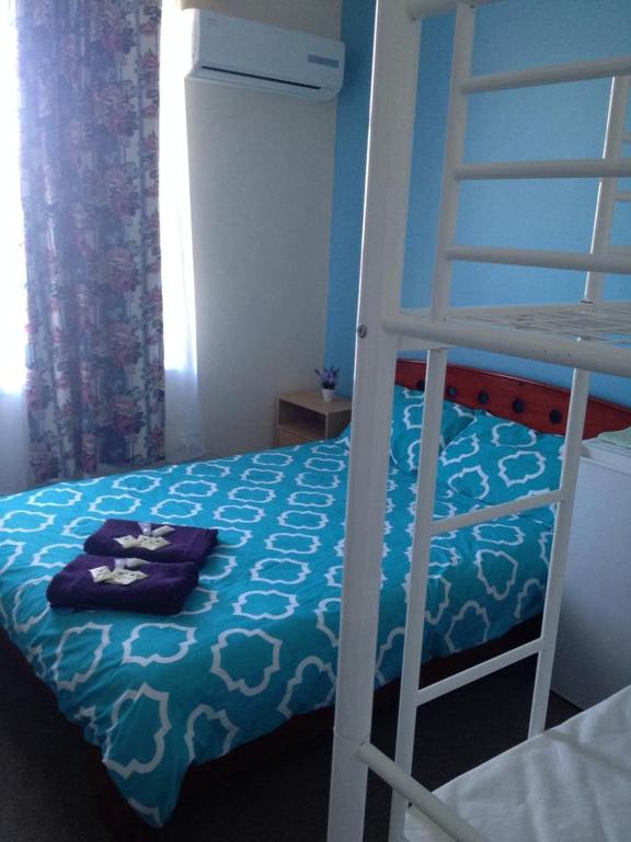 Postel nebo postele na pokoji v ubytování Port Adelaide Backpackers