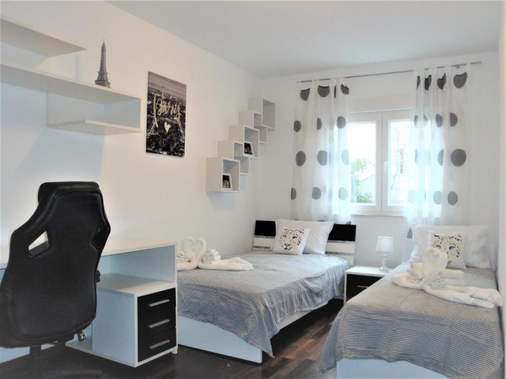 Postel nebo postele na pokoji v ubytování Apartment Viktoria - Trogir