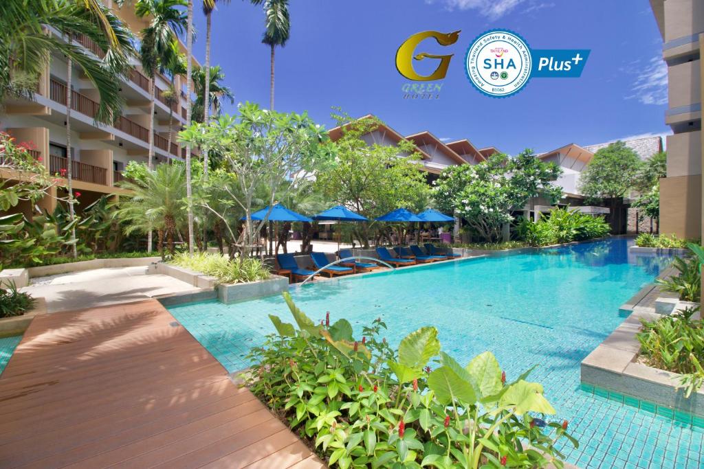 una piscina en el hotel en Deevana Plaza Krabi Aonang - SHA Extra Plus en Ao Nang Beach