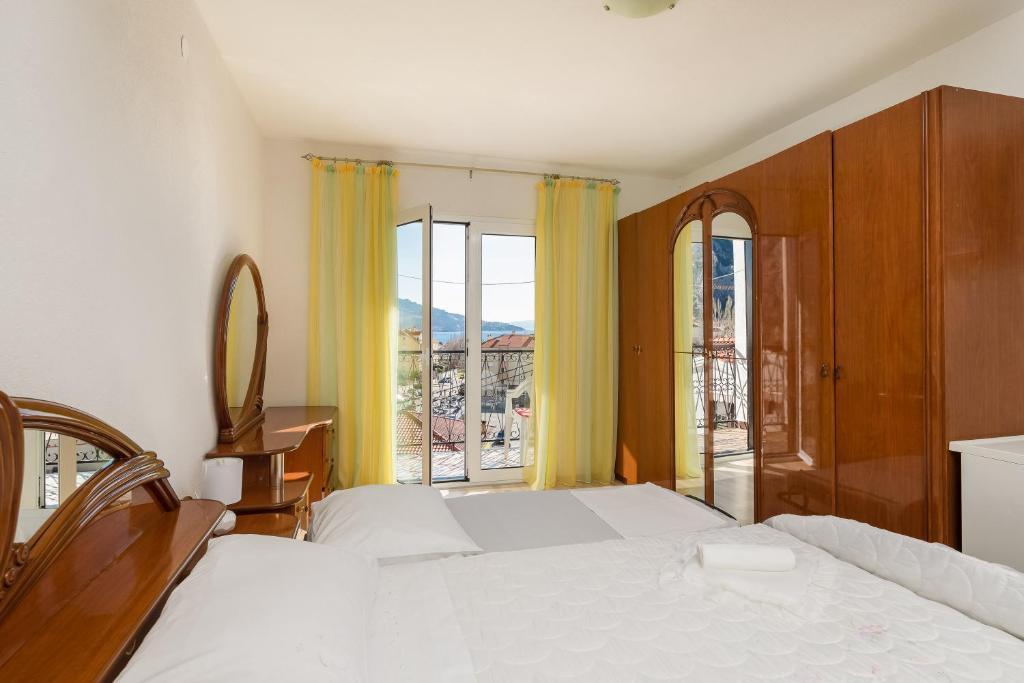 Posteľ alebo postele v izbe v ubytovaní Adriatic Apartment