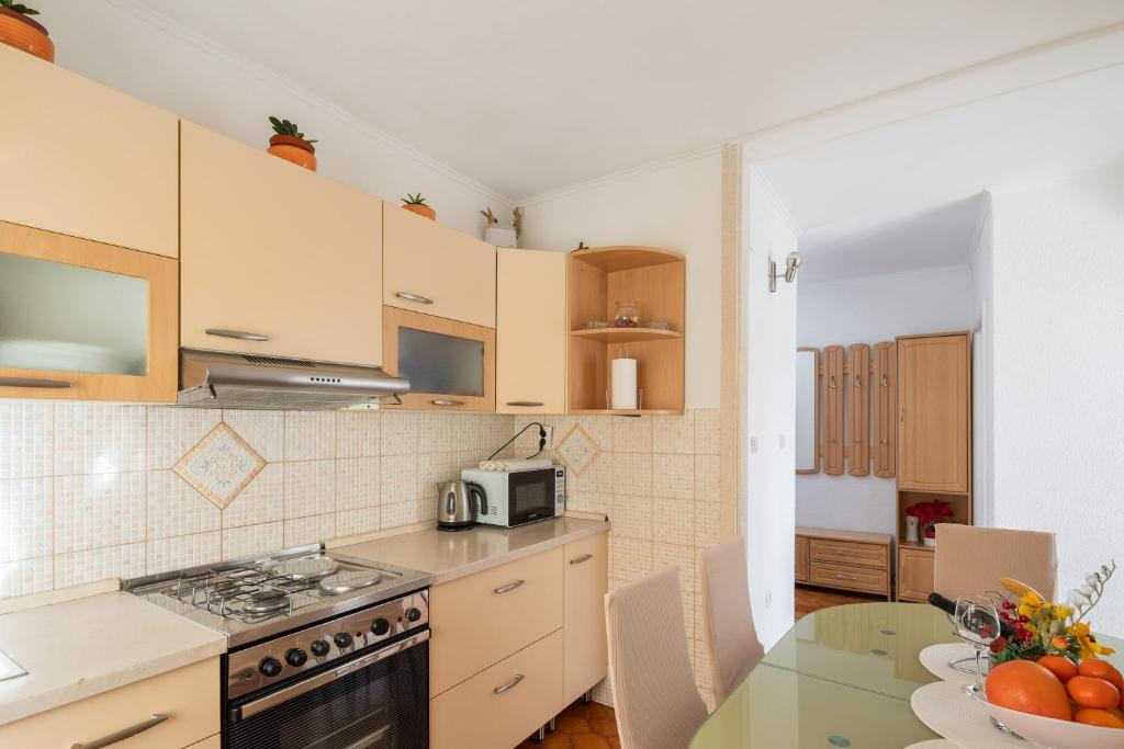 Kuchyňa alebo kuchynka v ubytovaní Adriatic Apartment
