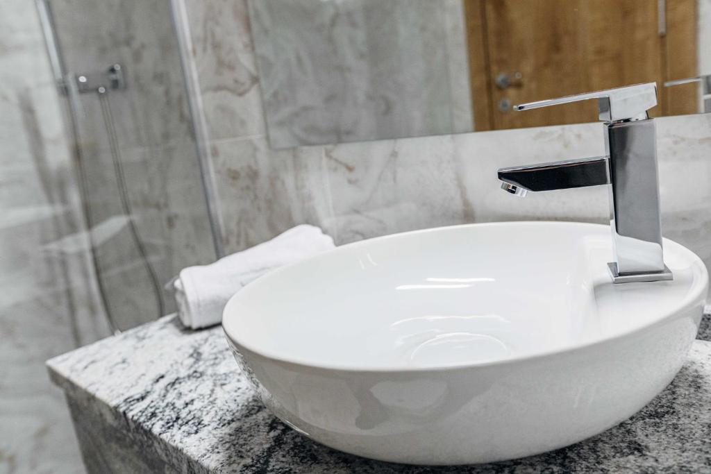 Koupelna v ubytování Hotel Livnica
