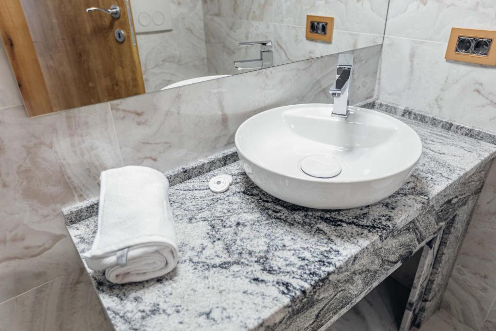 Koupelna v ubytování Hotel Livnica