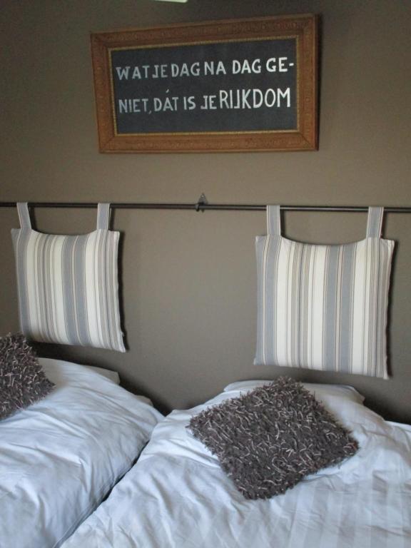 Postel nebo postele na pokoji v ubytování B&B De Pethaan