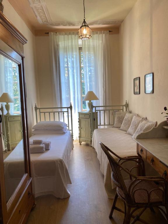 Łóżko lub łóżka w pokoju w obiekcie Love Italy Homes - Villa Edith