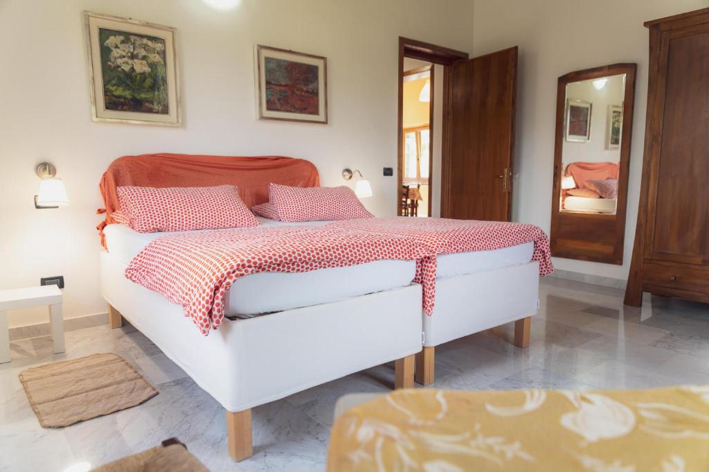 Postel nebo postele na pokoji v ubytování Agriturismo Tripala