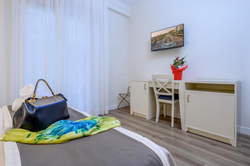 TV a/nebo společenská místnost v ubytování Atlas Hotel