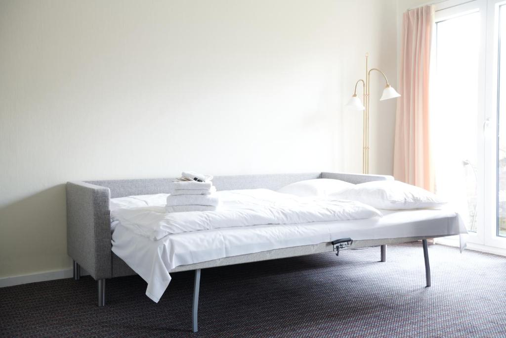 Postel nebo postele na pokoji v ubytování Montra Hotel Hanstholm