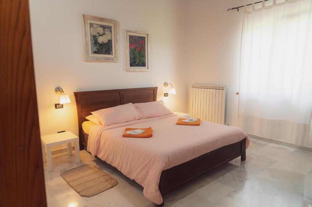Postel nebo postele na pokoji v ubytování Agriturismo Tripala