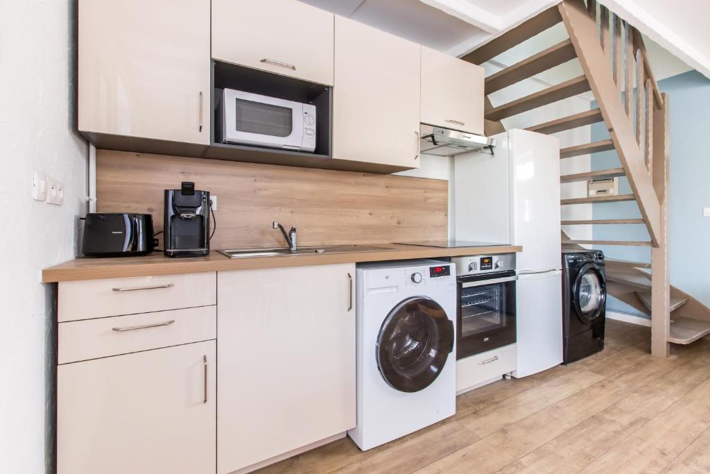 Kuchyň nebo kuchyňský kout v ubytování Maison Alice /Maison avec vue sur les champs