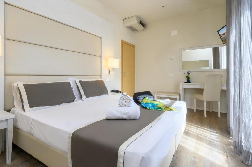 Postel nebo postele na pokoji v ubytování Atlas Hotel