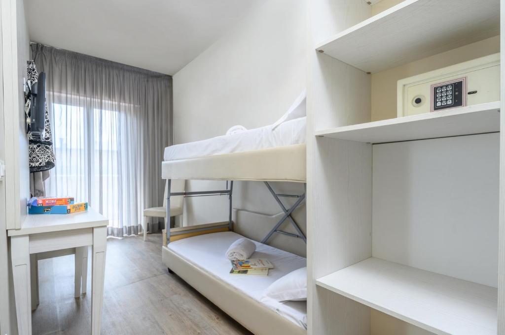 Postel nebo postele na pokoji v ubytování Atlas Hotel