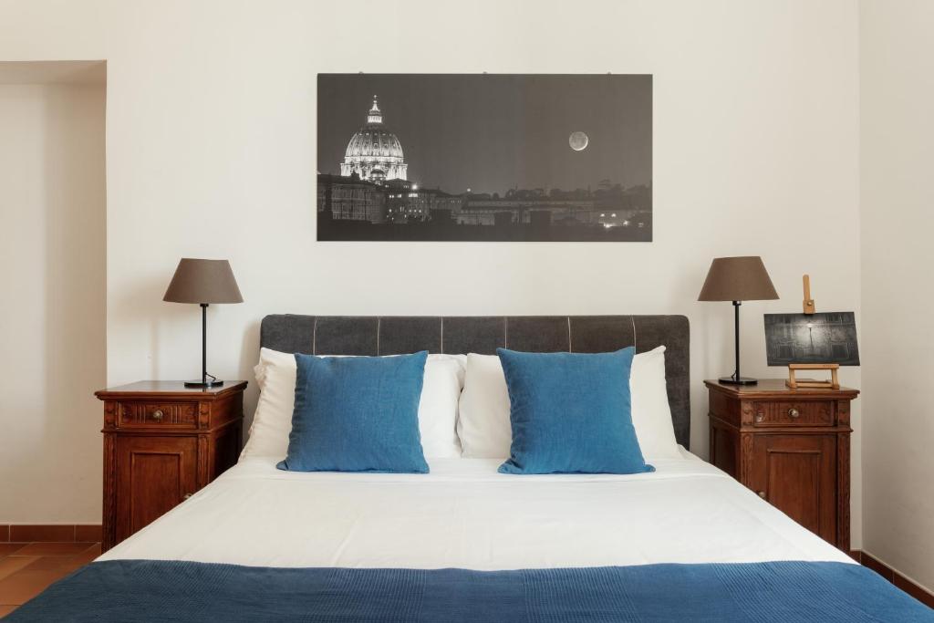 Postel nebo postele na pokoji v ubytování B&B Domus Quiritum