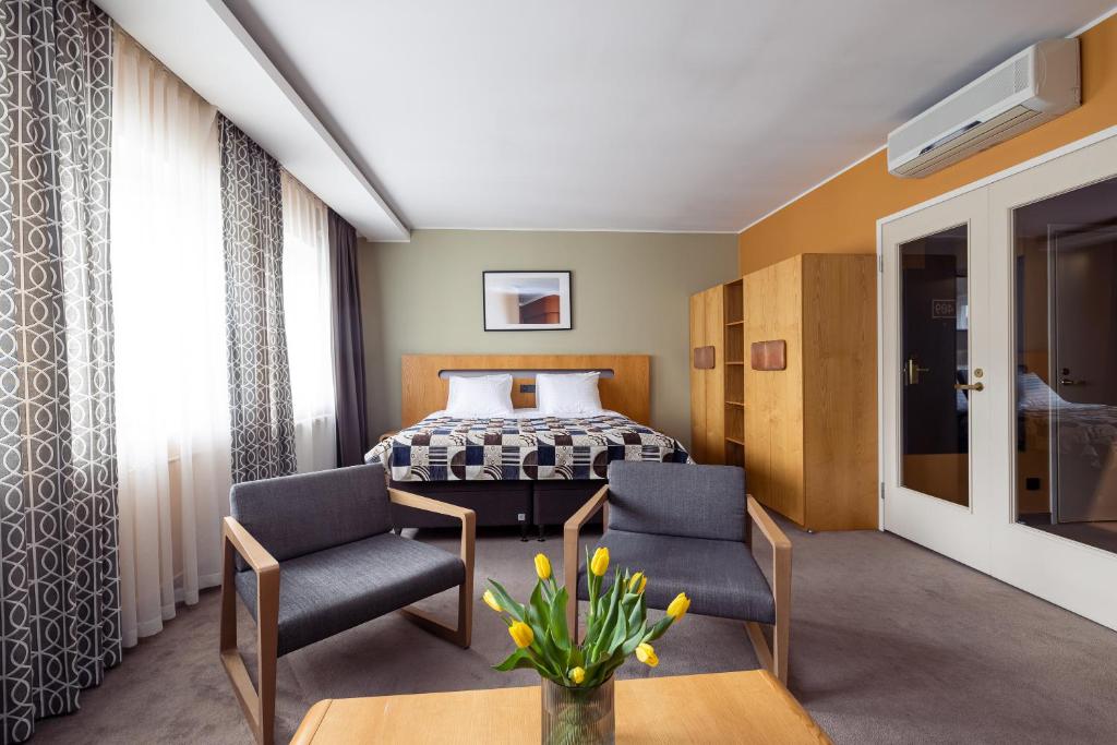 Voodi või voodid majutusasutuse Hotel Soho toas