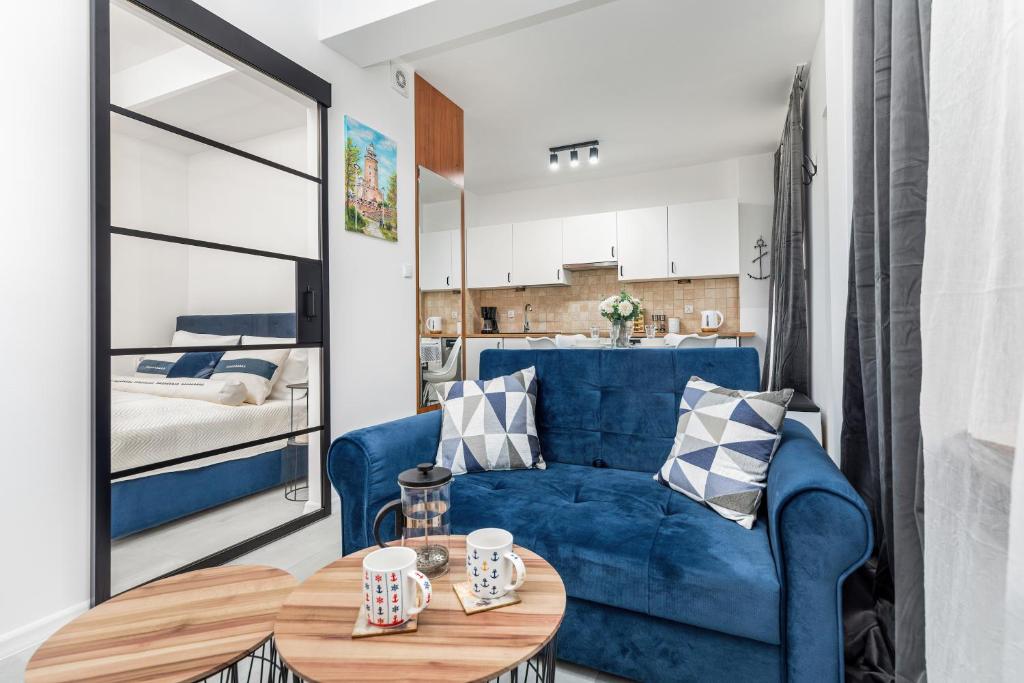Posedenie v ubytovaní Morski Apartament Arciszewskiego by Noclegi Renters
