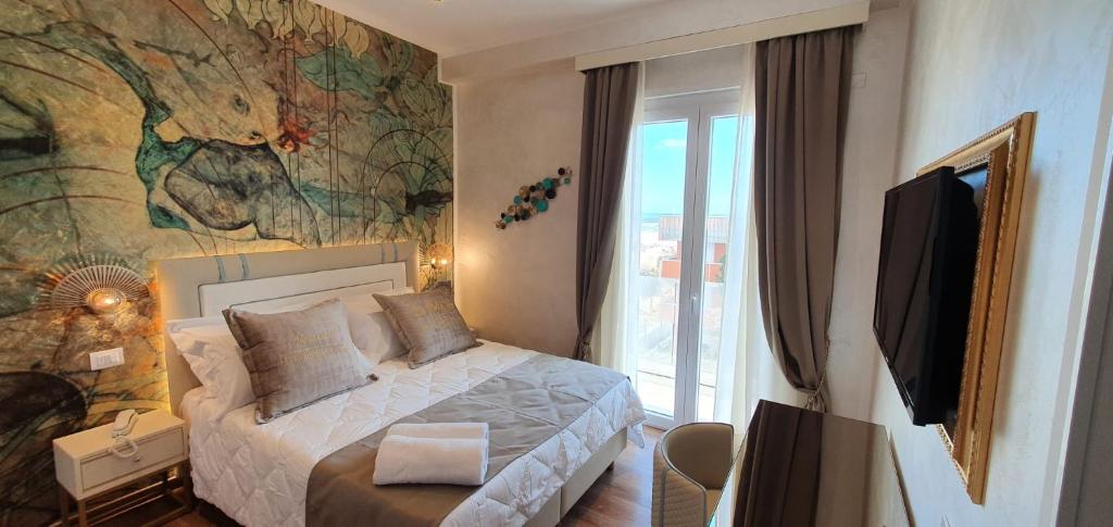 TV a/nebo společenská místnost v ubytování Amsterdam Suite Hotel & SPA
