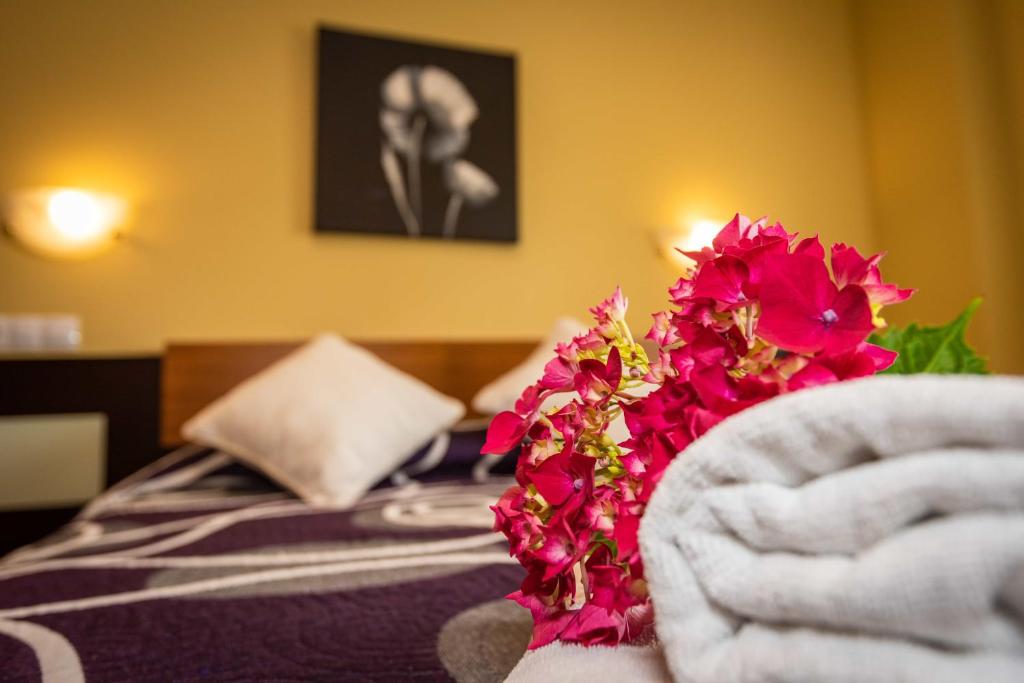 Łóżko lub łóżka w pokoju w obiekcie Apartamentos Casa Carin
