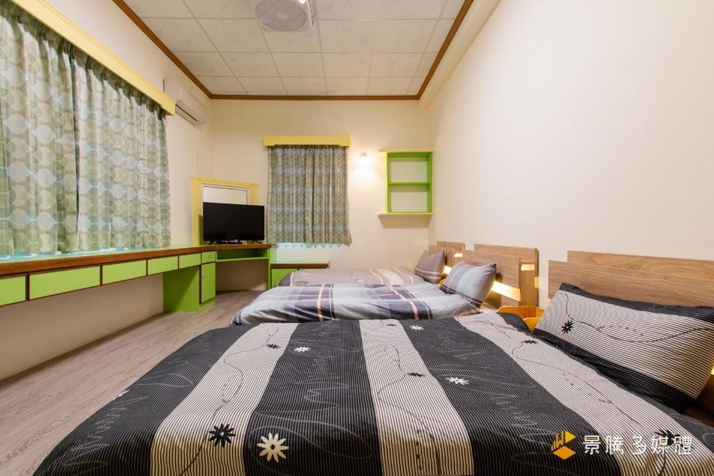 Un pat sau paturi într-o cameră la Bethel Homestay