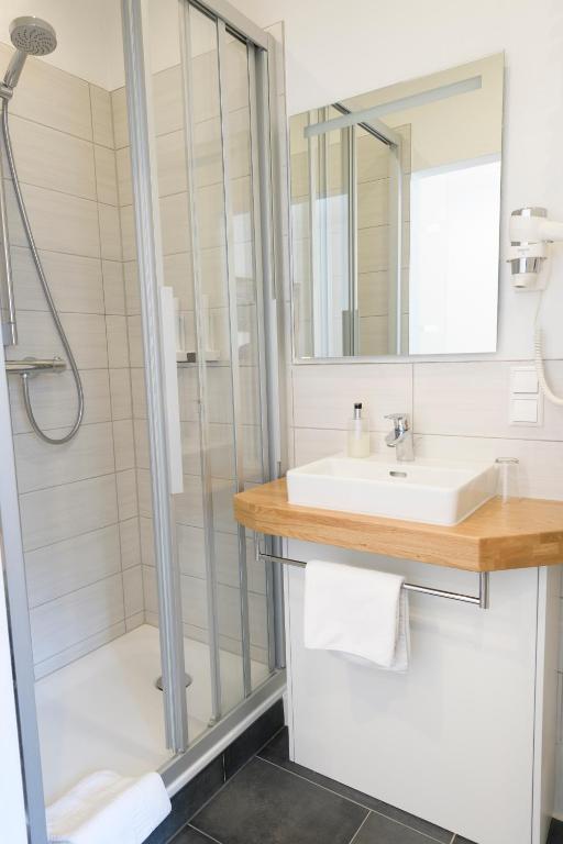 Koupelna v ubytování Hotel Garni Viktoria