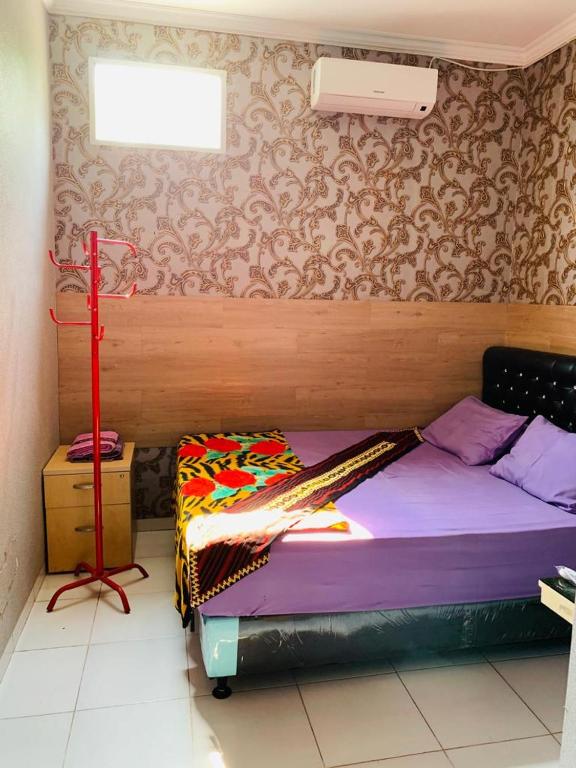 Letto o letti in una camera di Nuwono Tasya Syariah