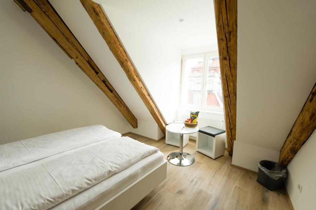 Postel nebo postele na pokoji v ubytování Hotel Garni Viktoria