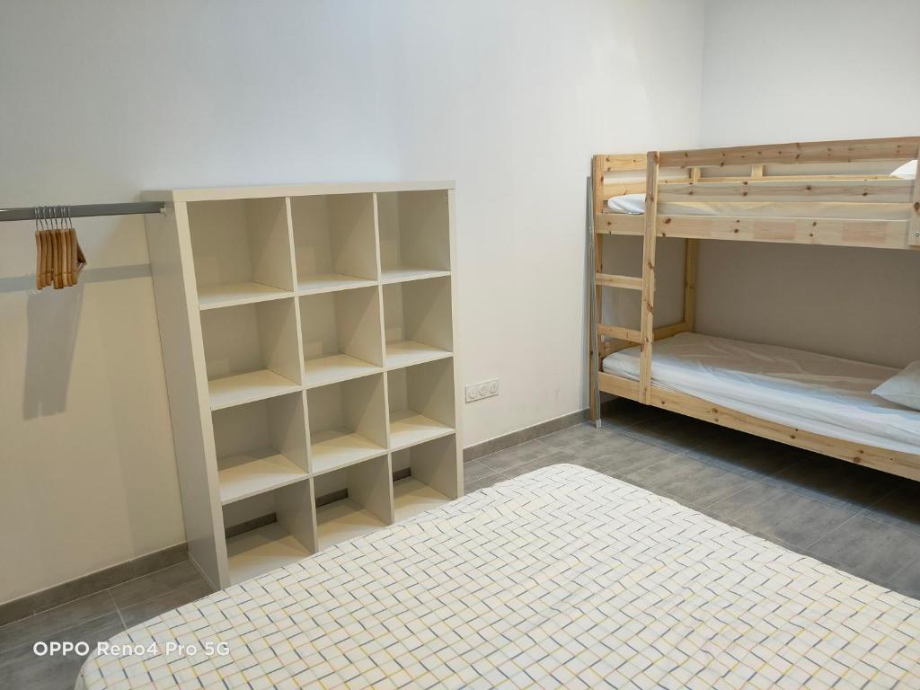 Postel nebo postele na pokoji v ubytování Domaines des confines