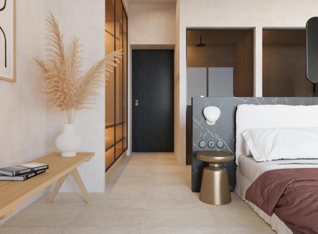Postel nebo postele na pokoji v ubytování Eden View Suites & Villas