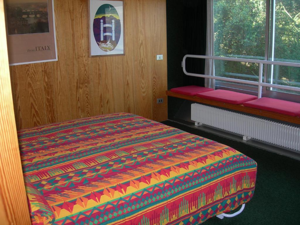 Postel nebo postele na pokoji v ubytování Appartamenti Vacanze Casa -Residence Albare - check in Vacanze Casa - Marilleva 900