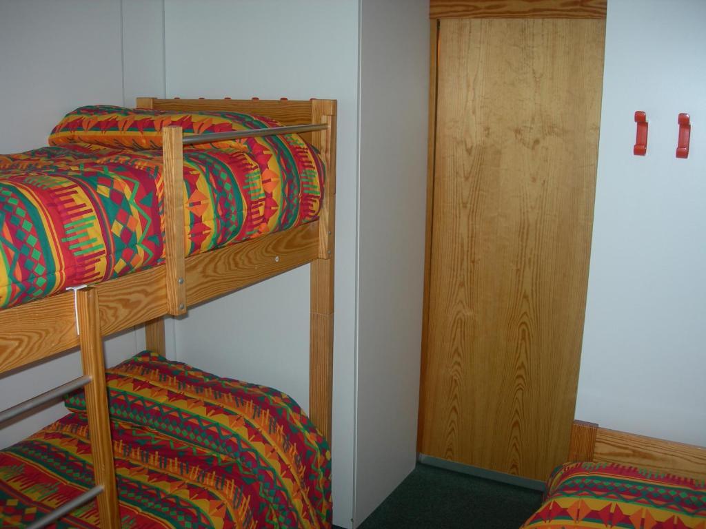 Postel nebo postele na pokoji v ubytování Appartamenti Vacanze Casa -Residence Albare - check in Vacanze Casa - Marilleva 900