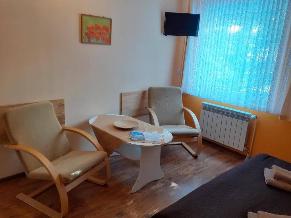 Posedenie v ubytovaní Willa Parkowa