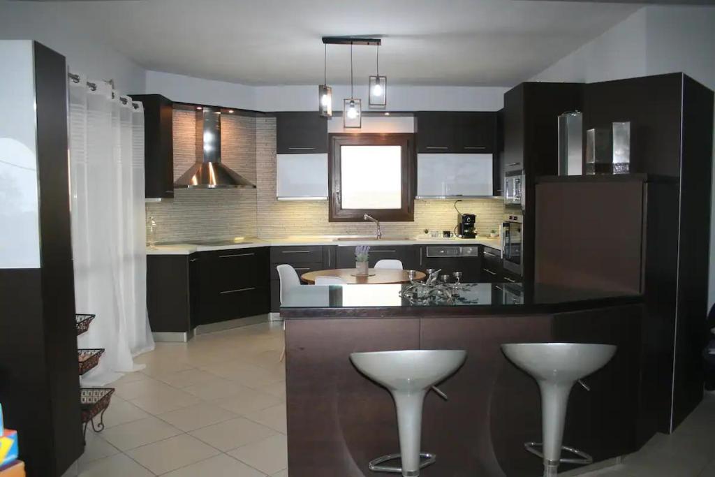 Fotografie z fotogalerie ubytování Moschoula Villa - Sea View Grand Apartment v destinaci Limenas