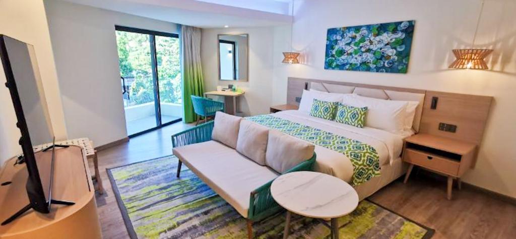 Postel nebo postele na pokoji v ubytování Lime Resort El Nido