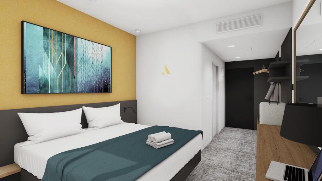 Postel nebo postele na pokoji v ubytování EA Congress Hotel Aldis