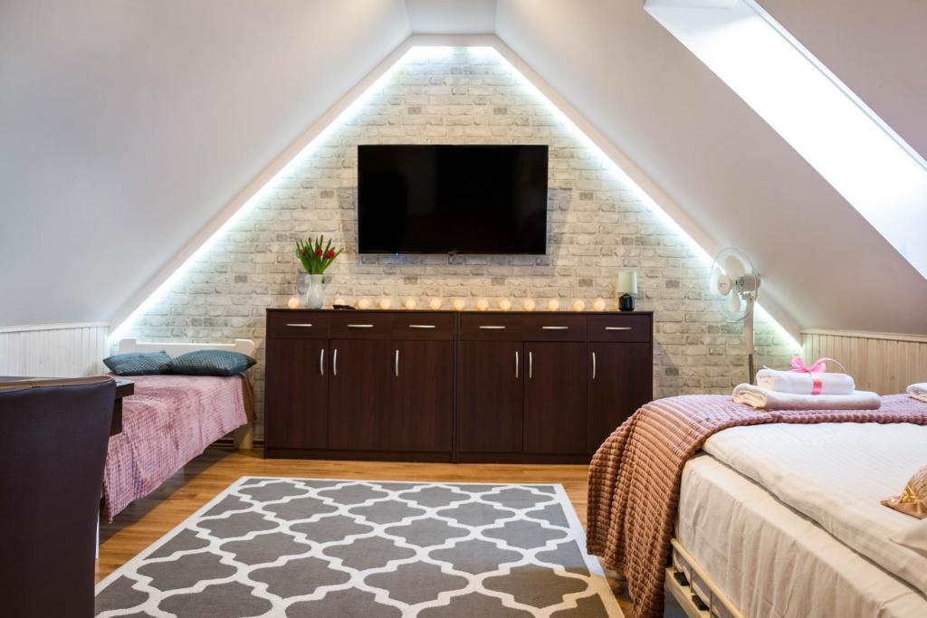 Postel nebo postele na pokoji v ubytování Apartamenty WIKTORIA morska18