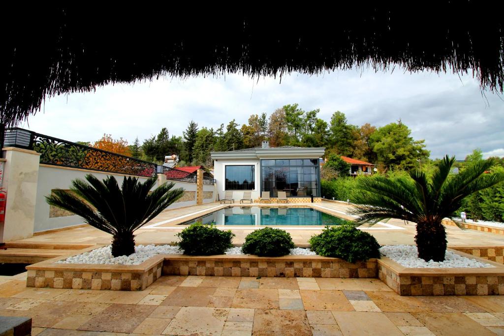 Bazén v ubytování Villa Meva 3 Bedroom Private Pool and Garden Fethiye nebo v jeho okolí