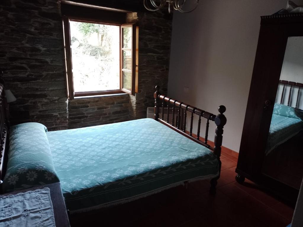 Postel nebo postele na pokoji v ubytování Casa Arza