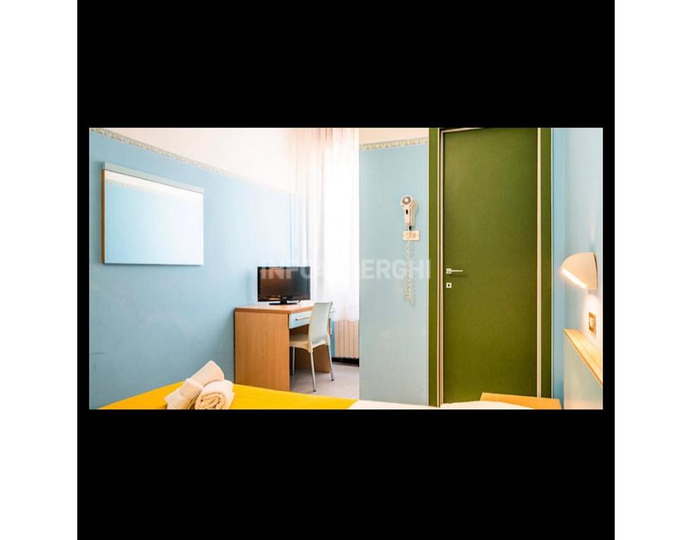 TV a/nebo společenská místnost v ubytování Hotel Silvana Beach