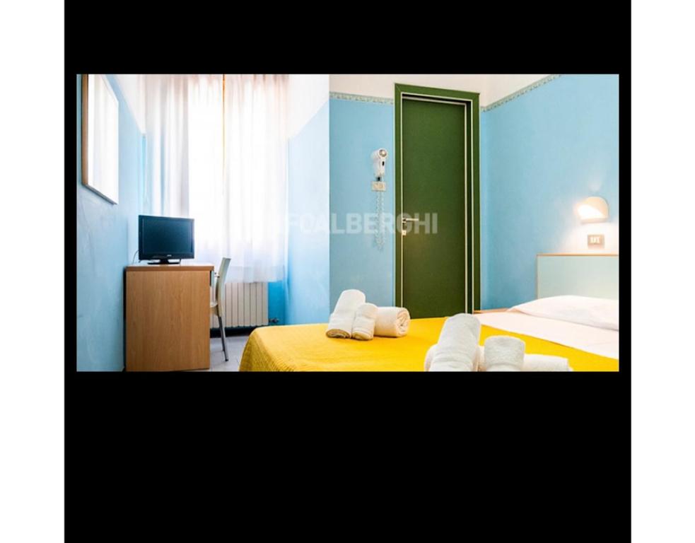 TV a/nebo společenská místnost v ubytování Hotel Silvana Beach