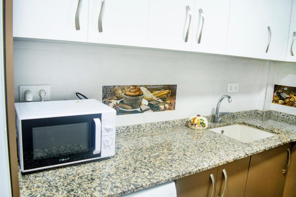 Kuchyň nebo kuchyňský kout v ubytování Apartamento Ibañez