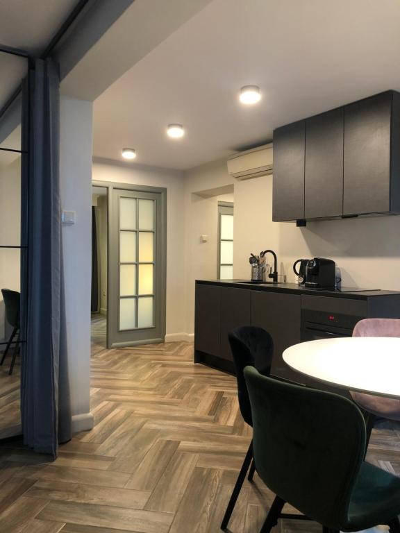 Kuchyň nebo kuchyňský kout v ubytování Arte-locum Apartamenty przy Rynku